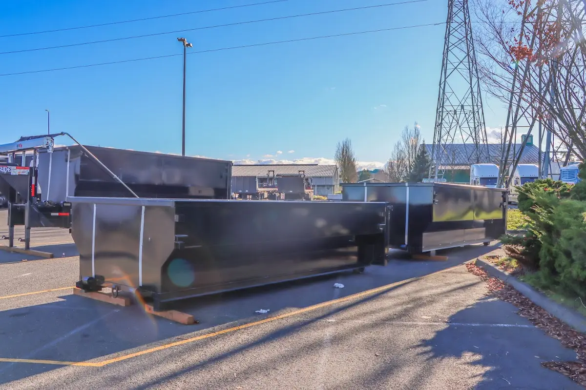 Roll-off dumpster ready for waste disposal at job site for Yard Waste Dumpster Rental in Minnehaha